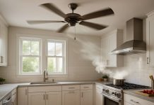 Modern kitchen with ceiling fan installed above, dispersing steam from cooking pot on stove.