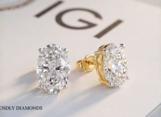 Lab-grown diamond oval stud earrings in gold setting with IGI certification background