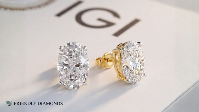 Lab-grown diamond oval stud earrings in gold setting with IGI certification background